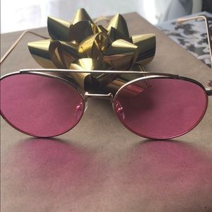 Gold frame pink lens sunglasses